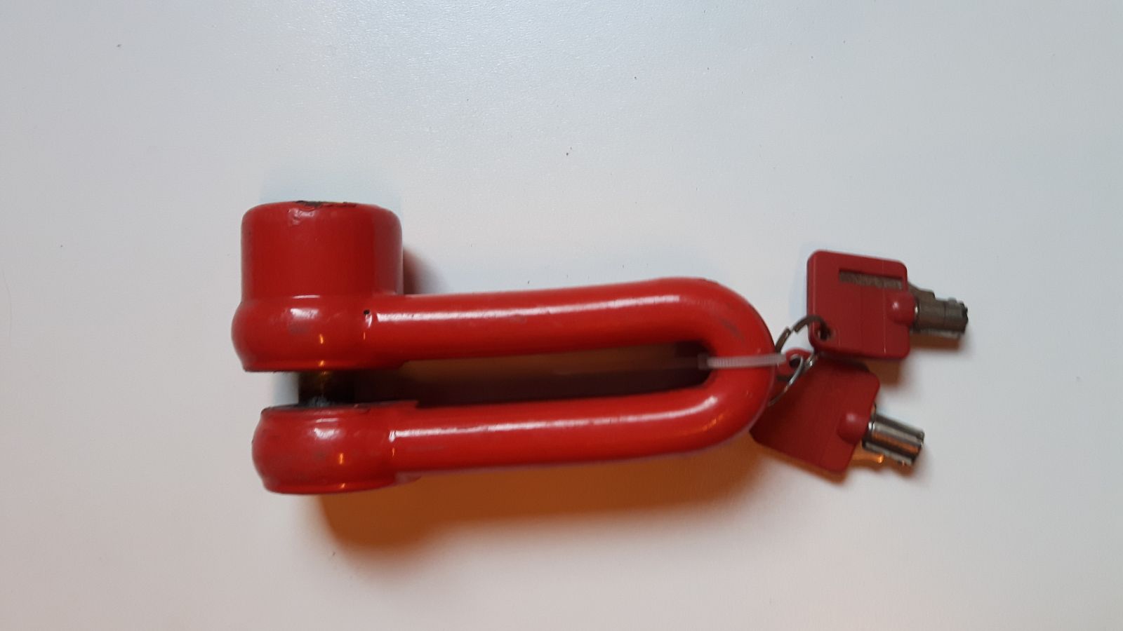 Rood remschijfslot met 2 sleutels